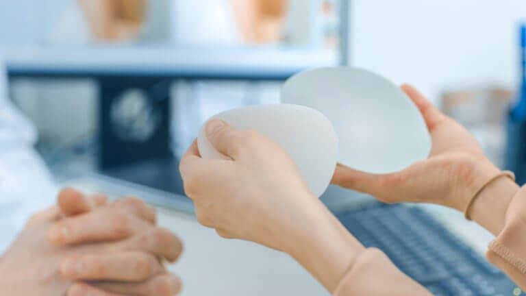 Do I Need a Breast Implant Exchange? Stock Photo