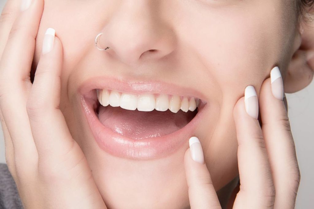 Can You Have Nose Job if You Have a Piercing? Stock Photo