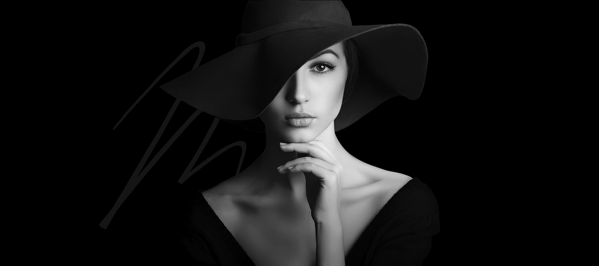 stock image of model with large hat