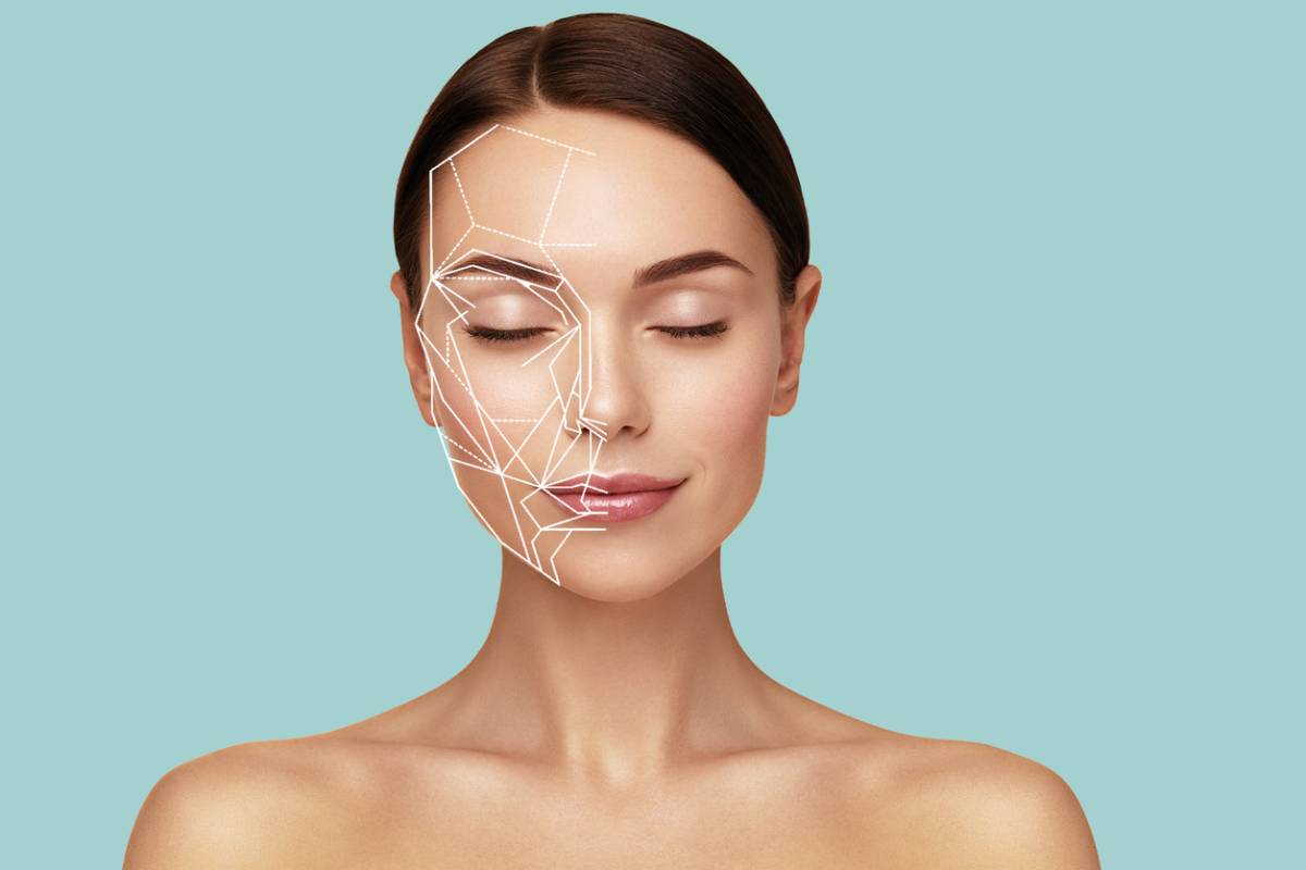 A woman with visible facial lines, reflecting age and experience, gazes thoughtfully into the distance.